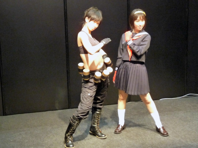 Illustration for article titled 2009's Cosplaying Arcade Game Booth Companions